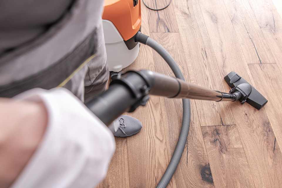 vacuuming hardwood floors